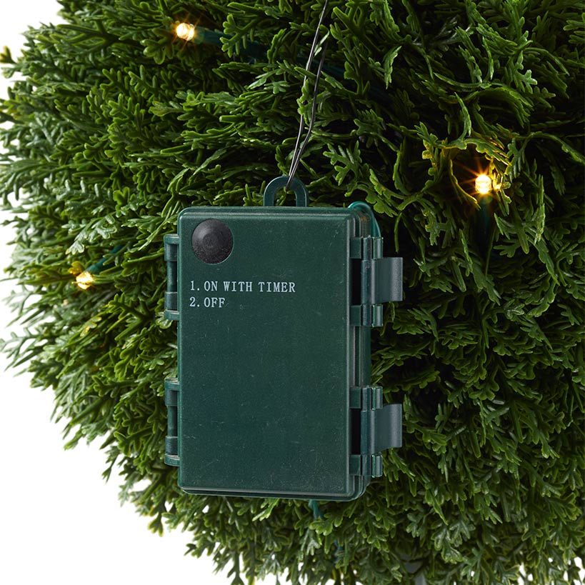 Lighted Pine Topiaries