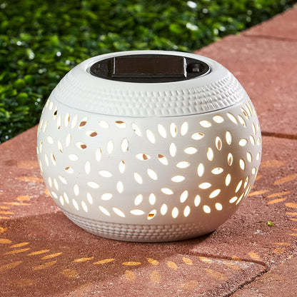 Solar Cutout Shadow Cast Round Table Lanterns